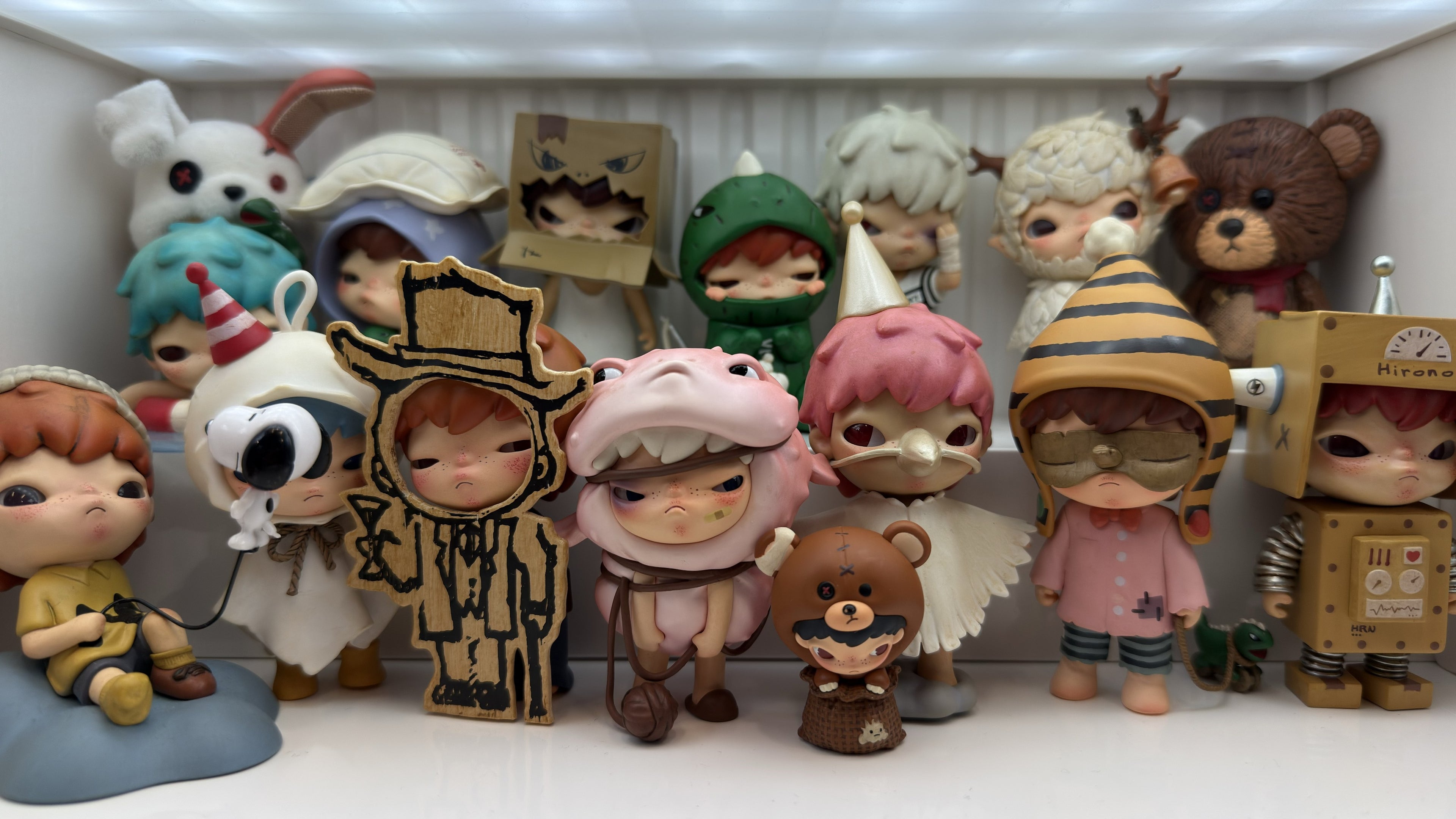 Hirono Pop Mart collection on shelf